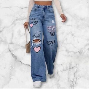 Women | High Waist & Ripped Jean Pants with Graffiti Print.